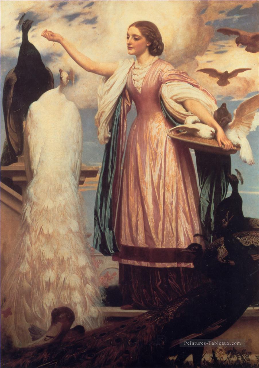 Une fille nourrissant des paons académisme Frederic Leighton Peintures à l'huile